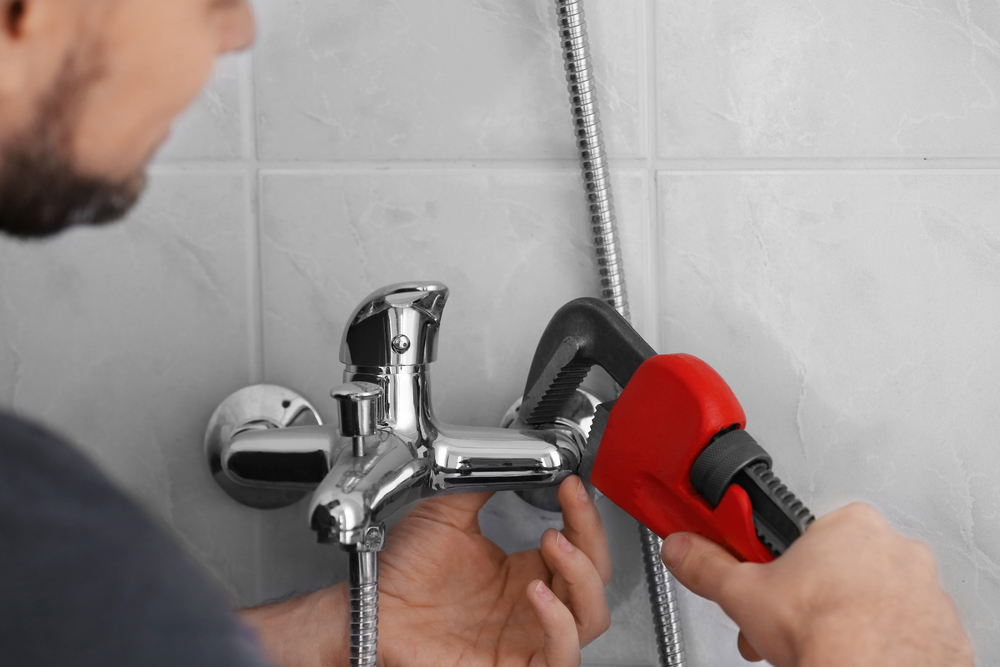 plumber doing a shower install